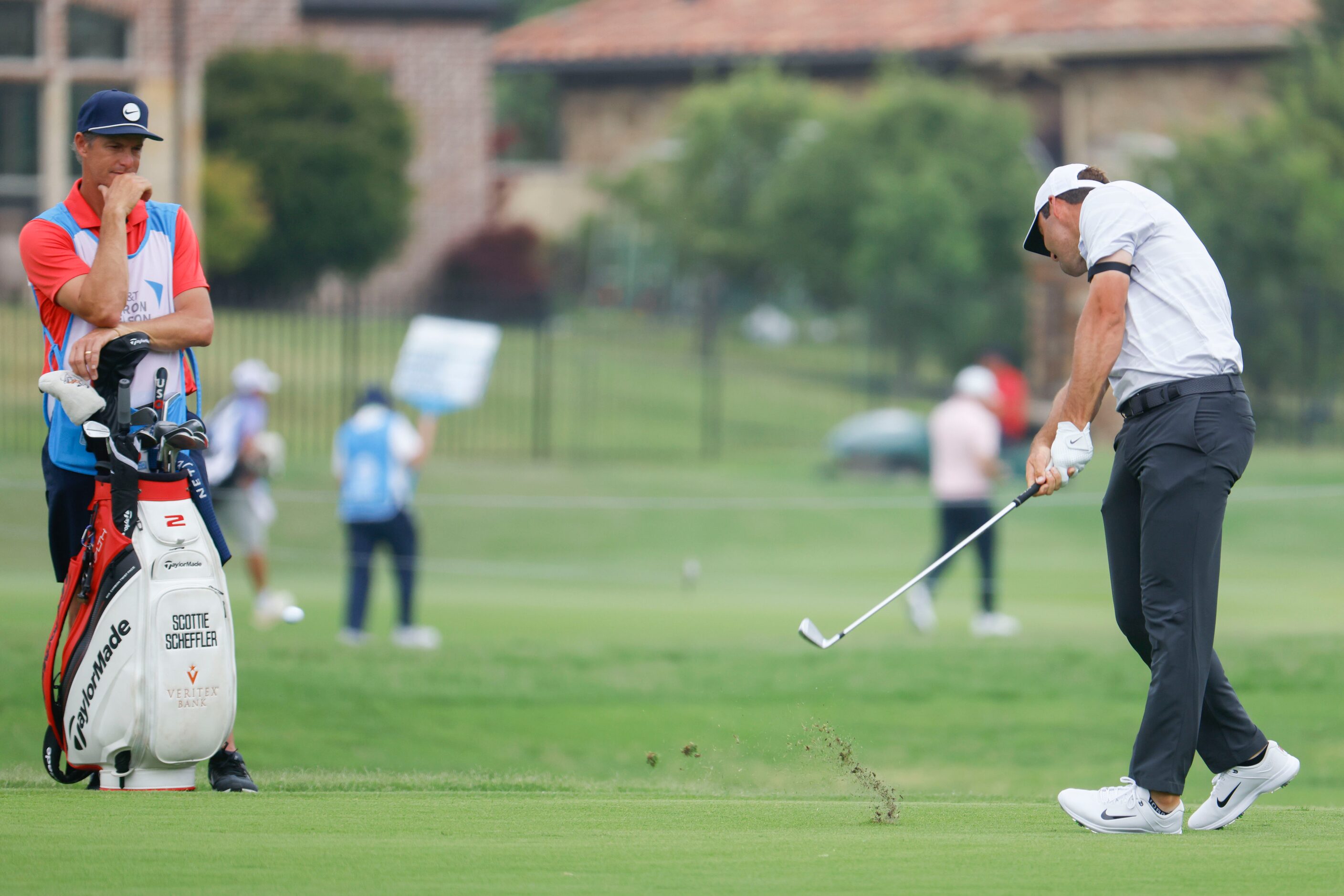 Scottie Scheffler of United States hits on the green of the ninth hole during the second...