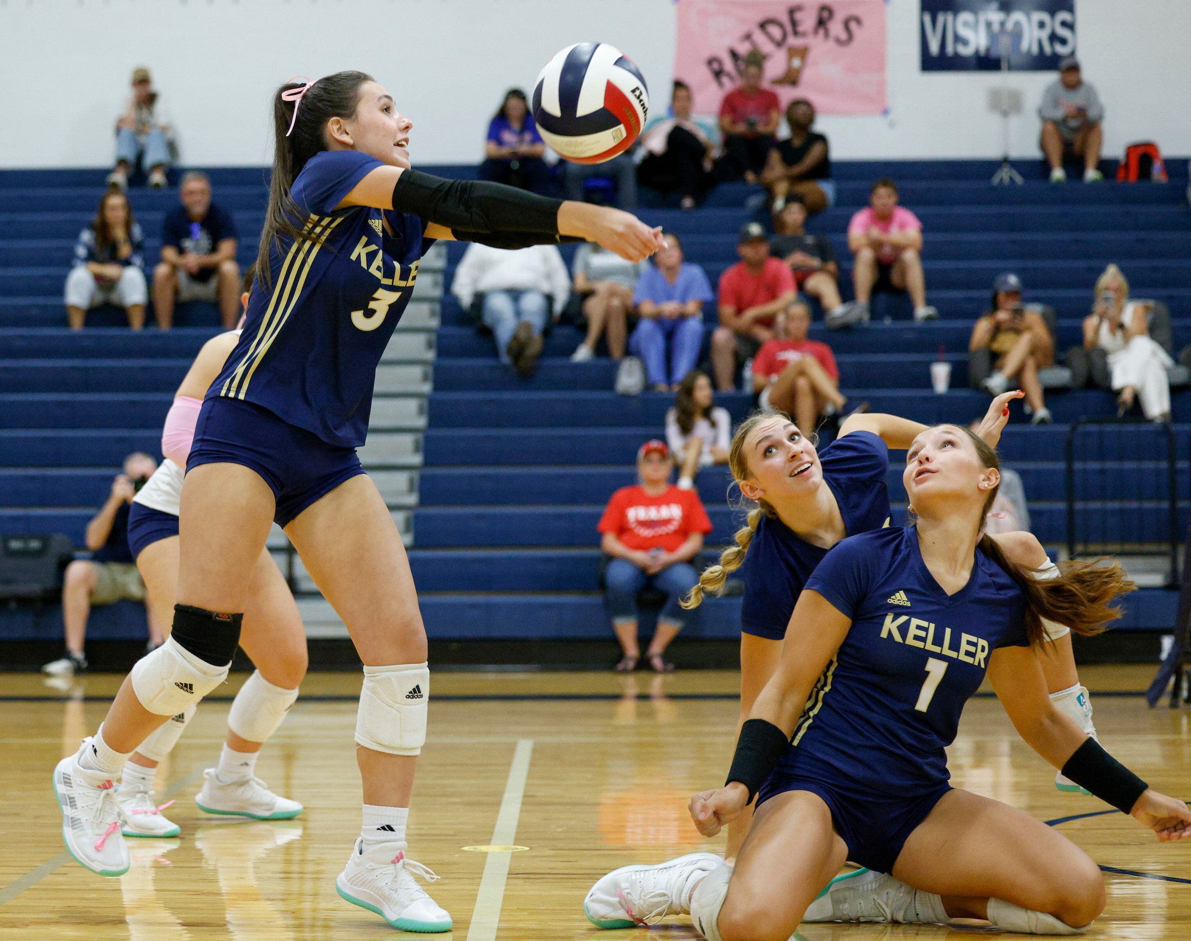 Keller's Ansley Shafer (3) plays the ball alongside Sydney Clark (1) during a high school...