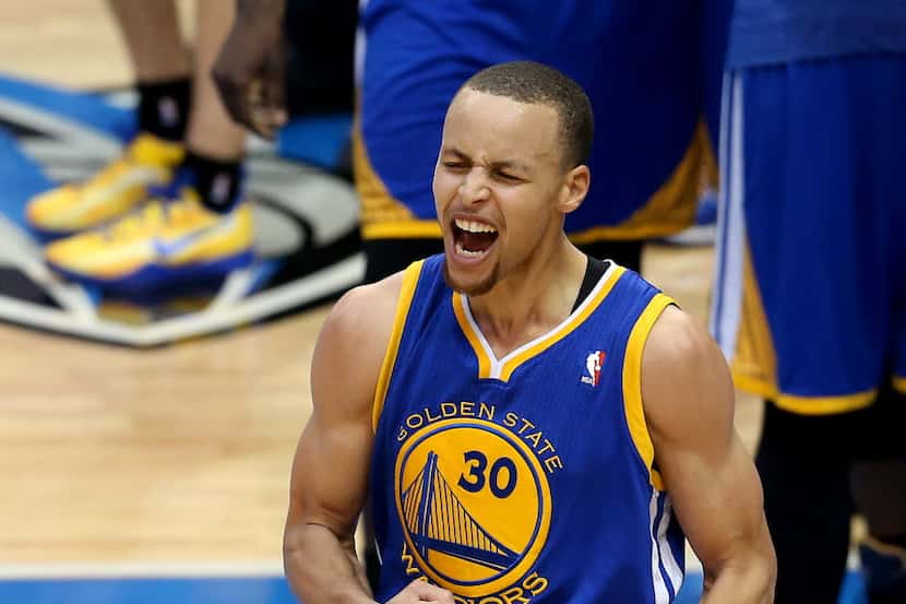 Golden State Warriors guard Stephen Curry (30) reacts to making the game-winning shot in the...