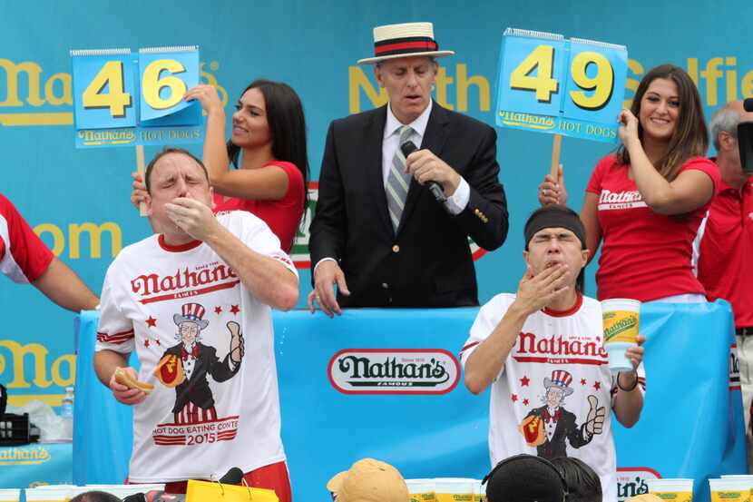 Joey Chestnut, left, and Matt Stonie compete in Nathan's Famous Fourth of July International...