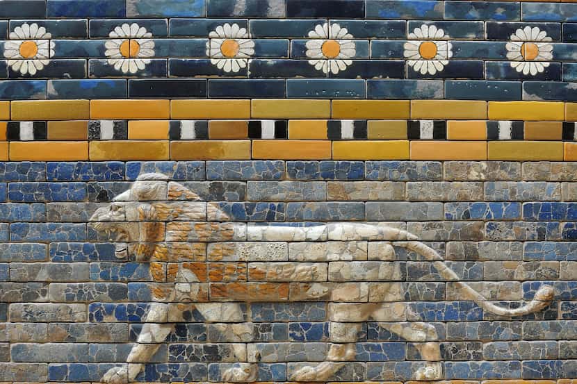 "Ancient glazed ceramic tiles from the gates of ancient Babylon (Iraq) depict a lion (604-...