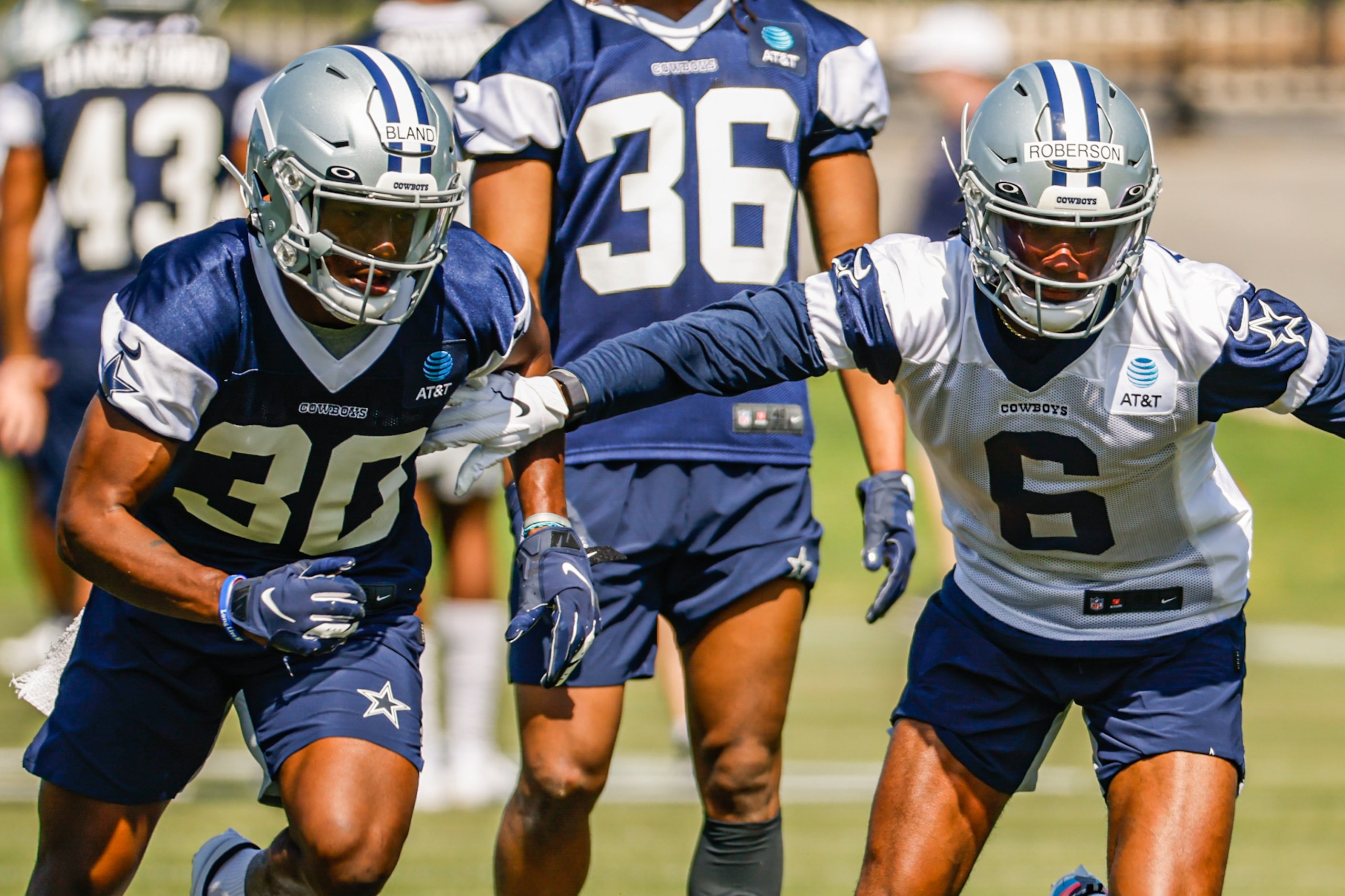 Dallas Cowboys cornerback (30) DaRon Bland and wide receiver (6) Jaquarii Roberson during a...