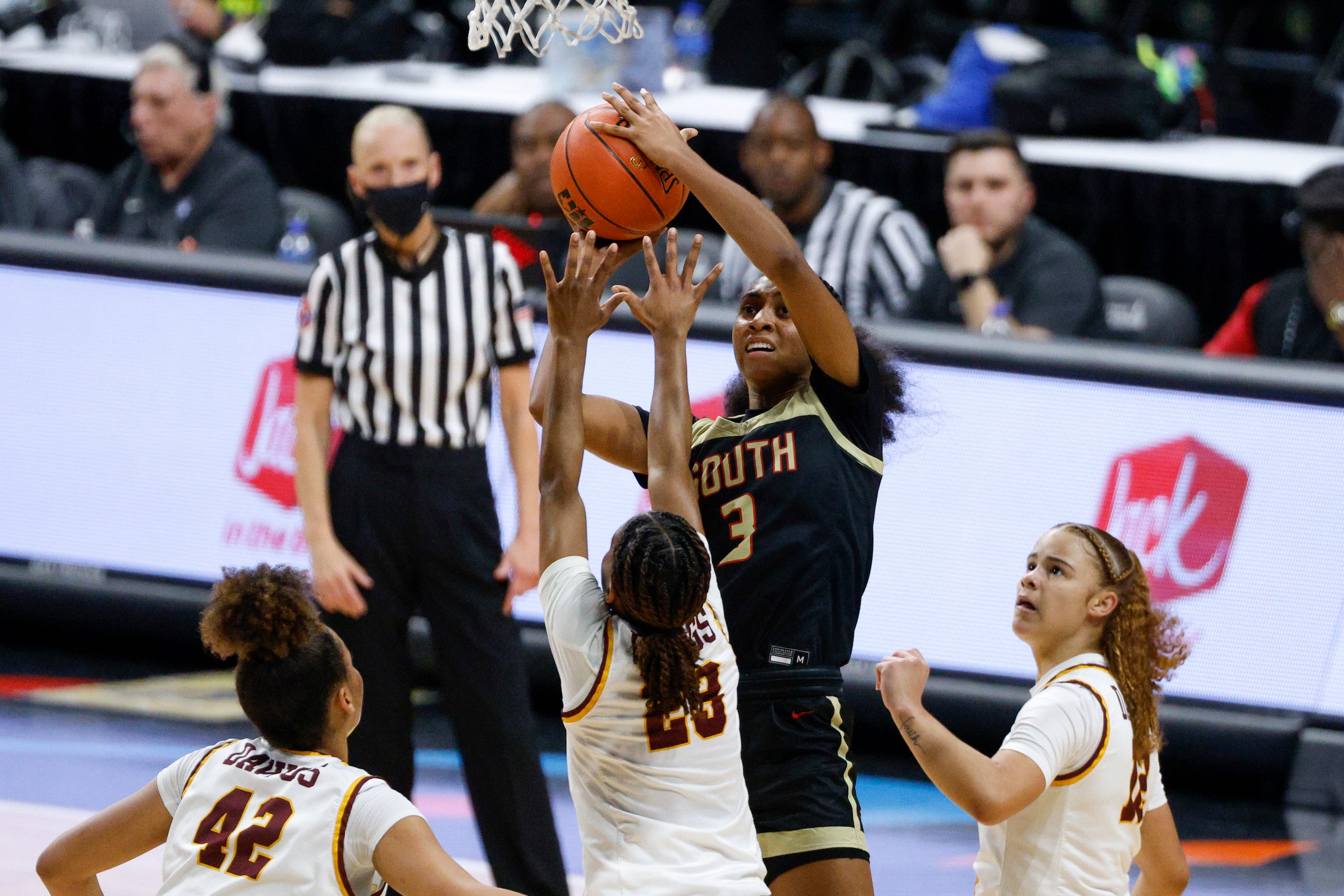 South Grand Prairie guard Taylor Barnes (3) shoots over Humble Summer Creek guard Anahlynn...