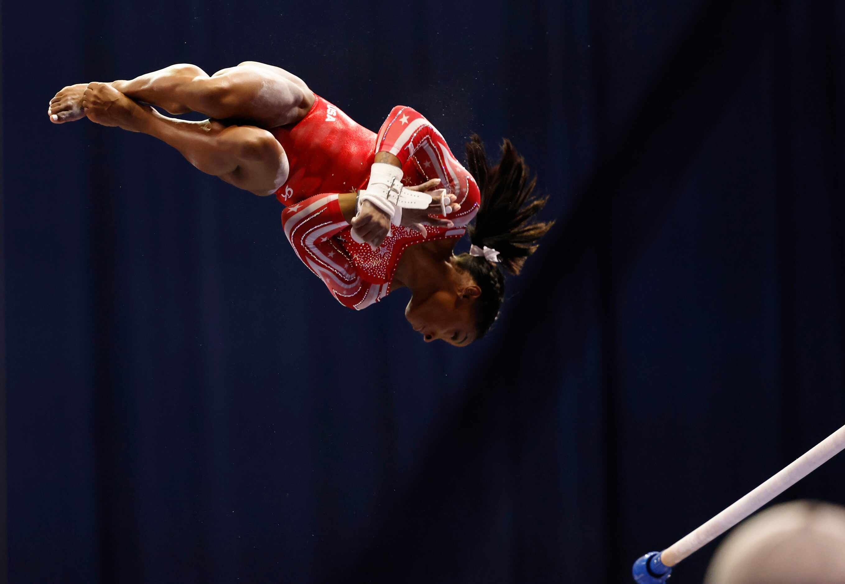 Simone Biles competes on the uneven bars during day 2 of the women's 2021 U.S. Olympic...