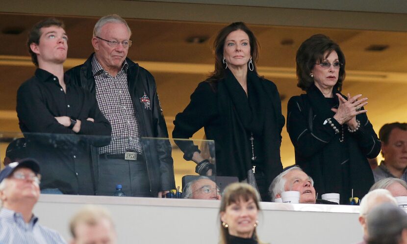 The Jones family looks on from their suite during the second half of a UIL Class 5A Division...