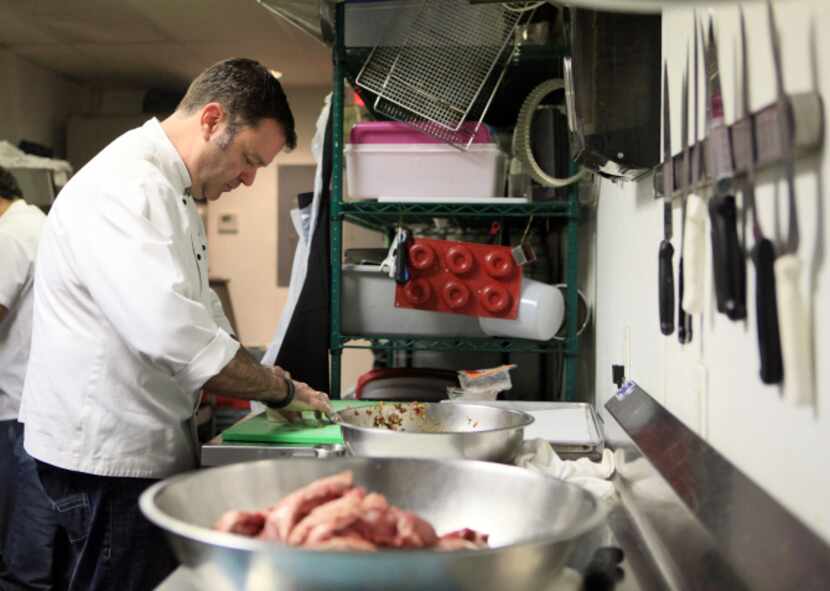 Chef-owner Abraham Salum prepares dumplings at his restaurant in 2013.