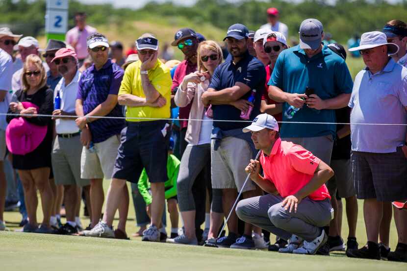 Jordan Spieth lines up a shot on the first green during round 4 of the AT&T Byron Nelson...