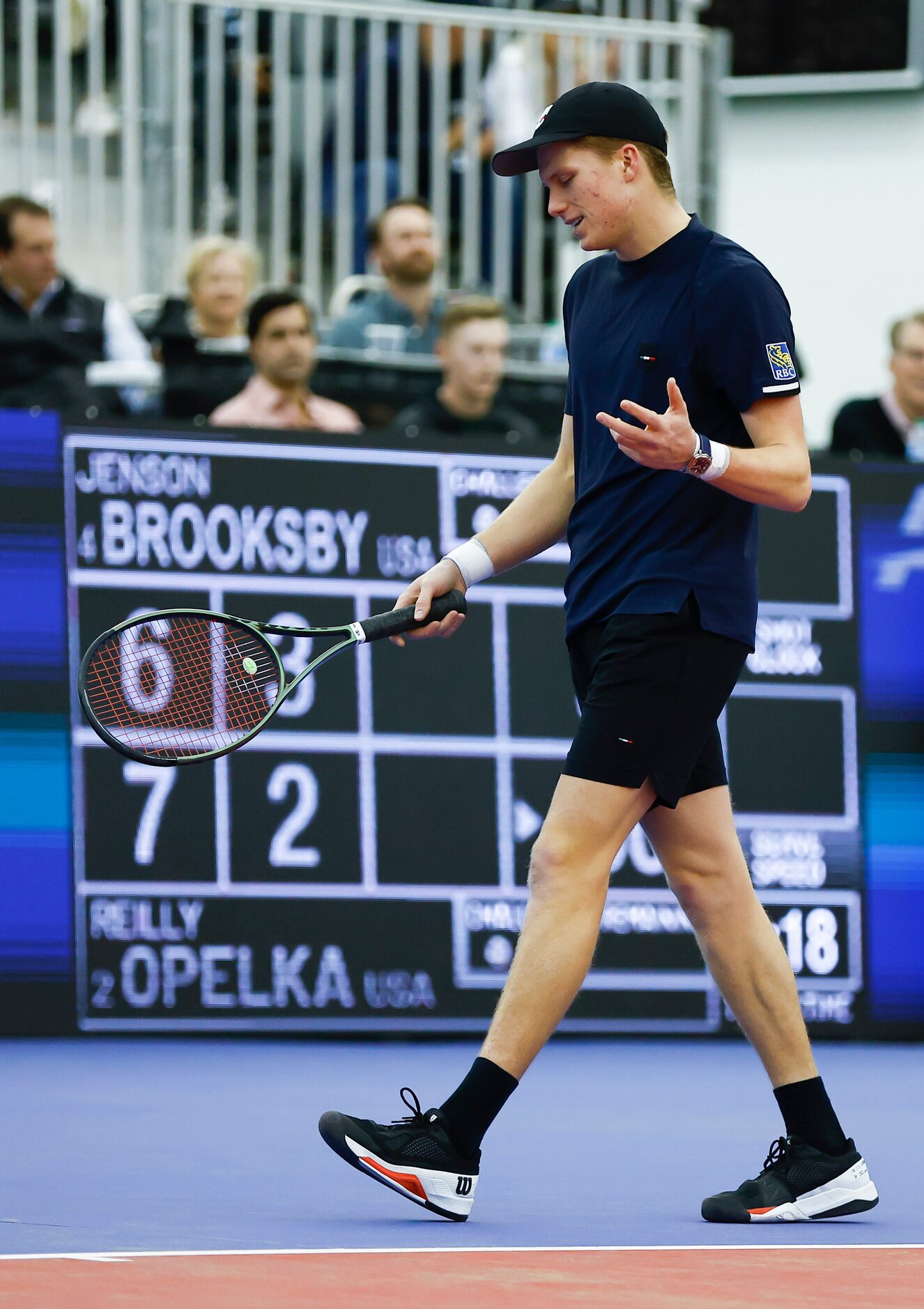 Jenson Brooksby reacts after giving up a point during the finals of the ATP Dallas Open...