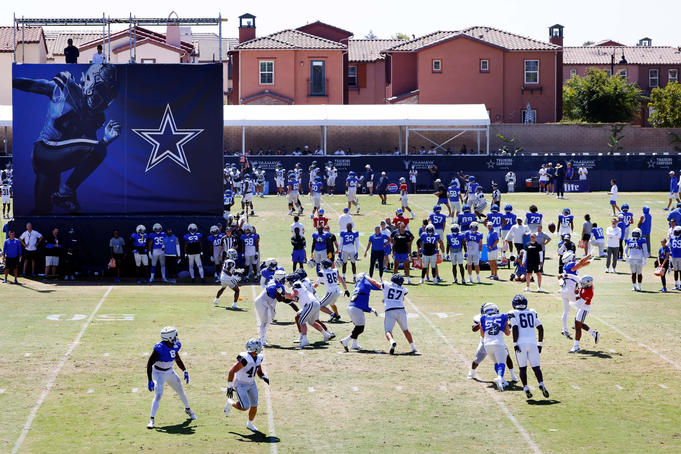 Dallas Cowboys quarterback Dak Prescott (4) has his pass deflected by Los Angeles Rams...