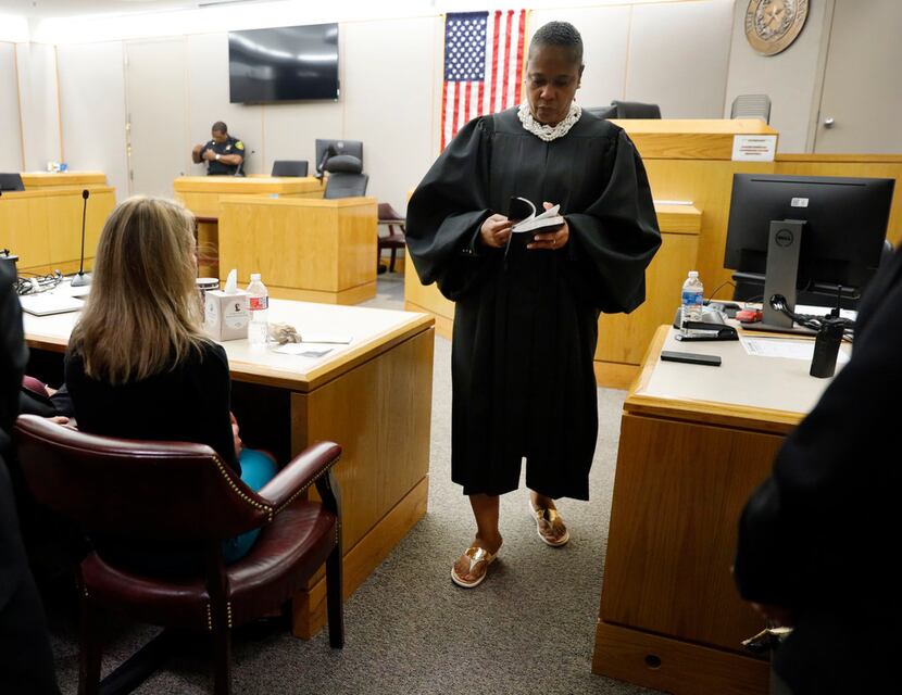 Judge Tammy Kemp opened a Bible to John 3:16 before giving it to Amber Guyger. The Freedom...