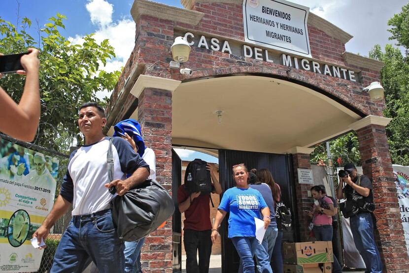 Central American migrants who were staying at La Casa del Migrante (The Migrant's House)...
