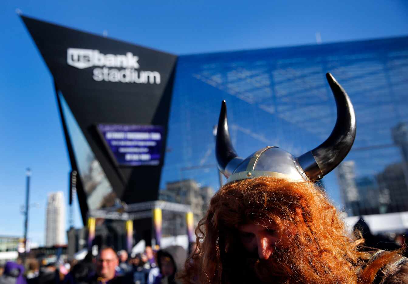 A Minnesota Vikings fan dressed the part as he waited outside U.S. Bank Stadium in...