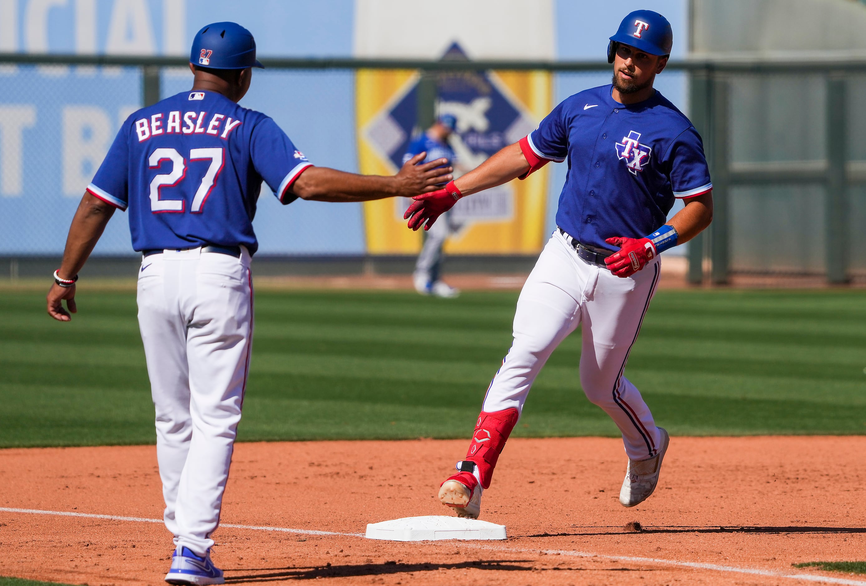 Josh Lowe on first base doing his best to annoy his big bro Nathaniel :  r/baseball