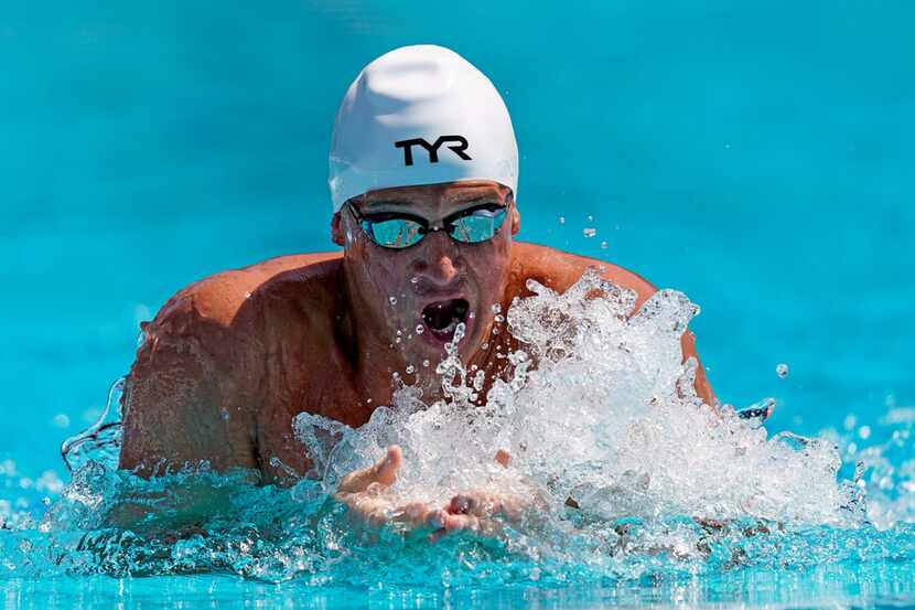 Ryan Lochte competes in the men's 200-meter individual medley time trial at the U.S....