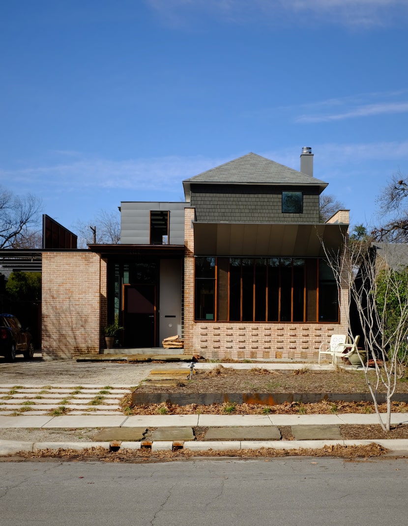 The Shipley-Bauman residence fits in to its Cochran Heights neighborhood, a modern house...