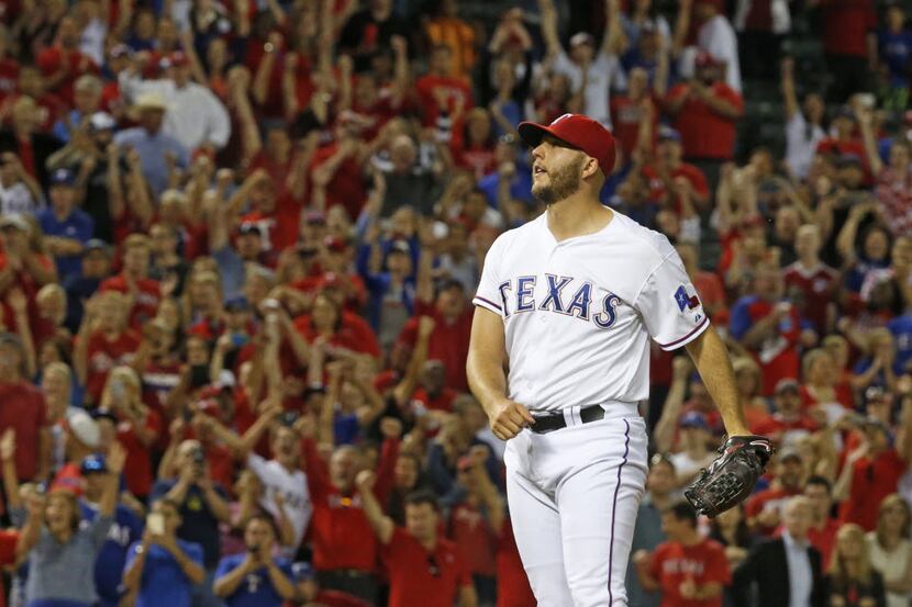 Texas Rangers relief pitcher Shawn Tolleson (37) reacts after getting a strikeout for the...