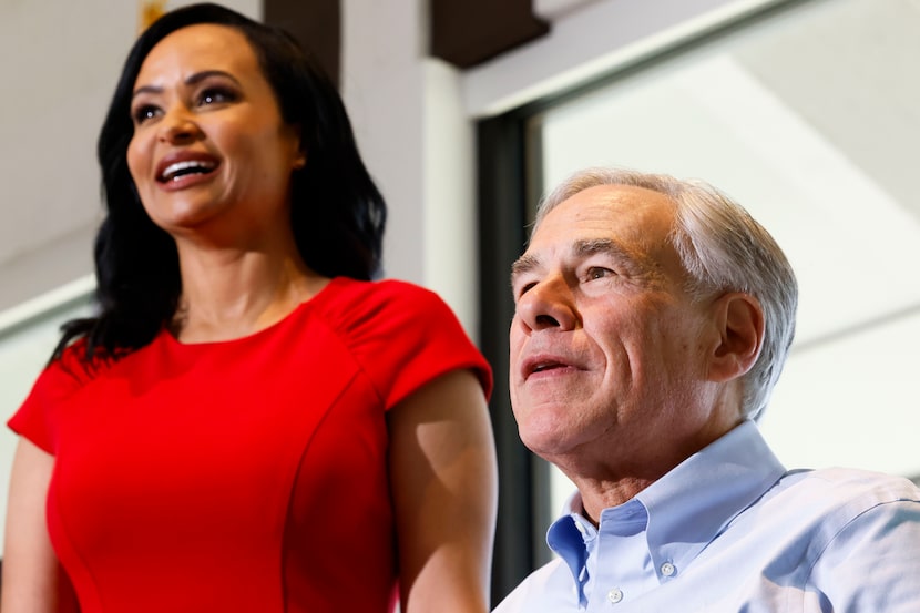 House District 33 Republican candidate Katrina Pierson (left) and Gov. Greg Abbott pose for...