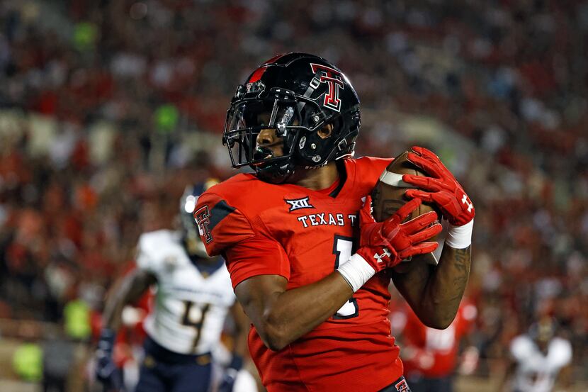 Texas Tech's Myles Price (1) catches the ball during the second half of the team's NCAA...
