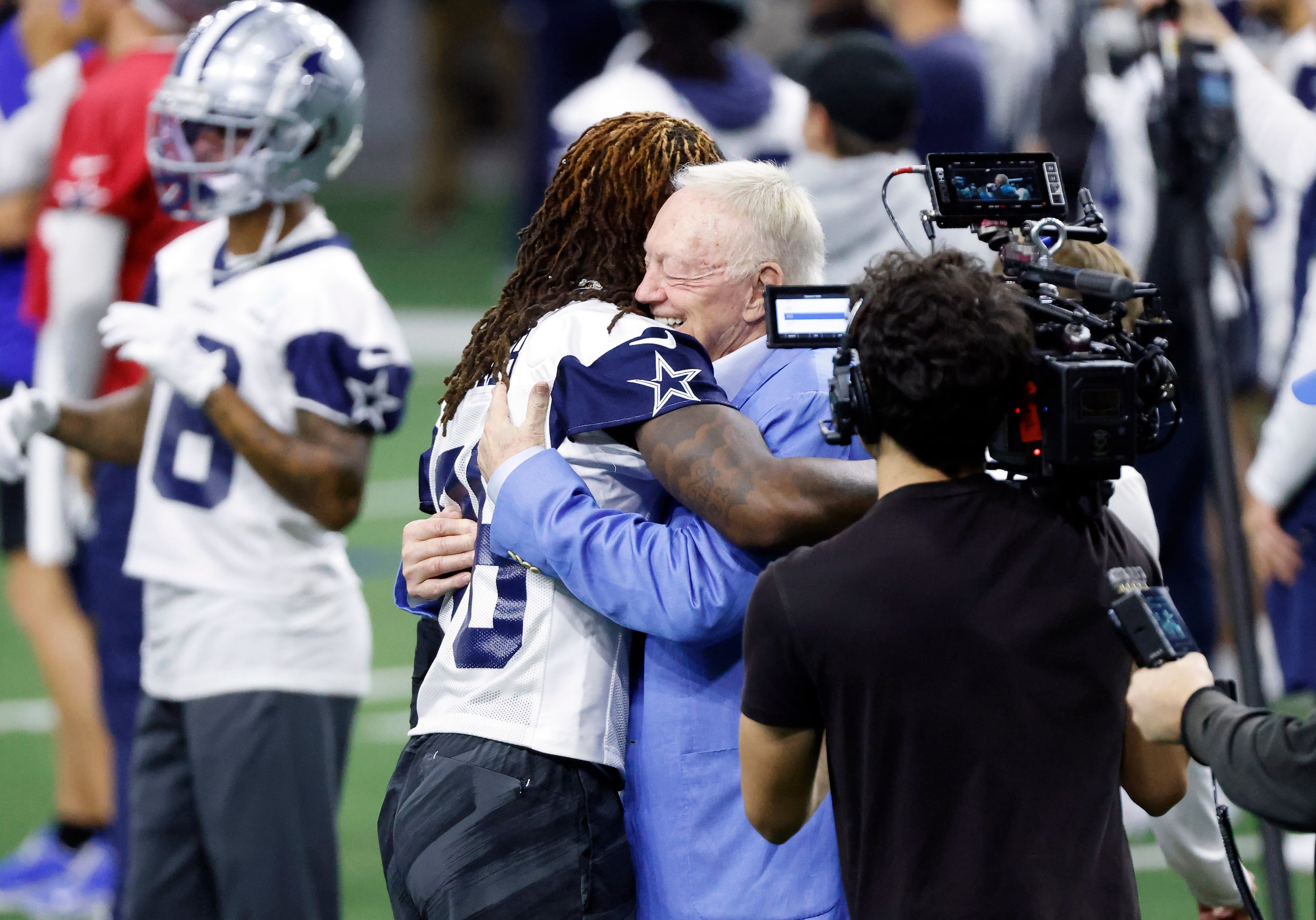 Newly signed Dallas Cowboys wide receiver CeeDee Lamb (88) and owner Jerry Jones embrace one...