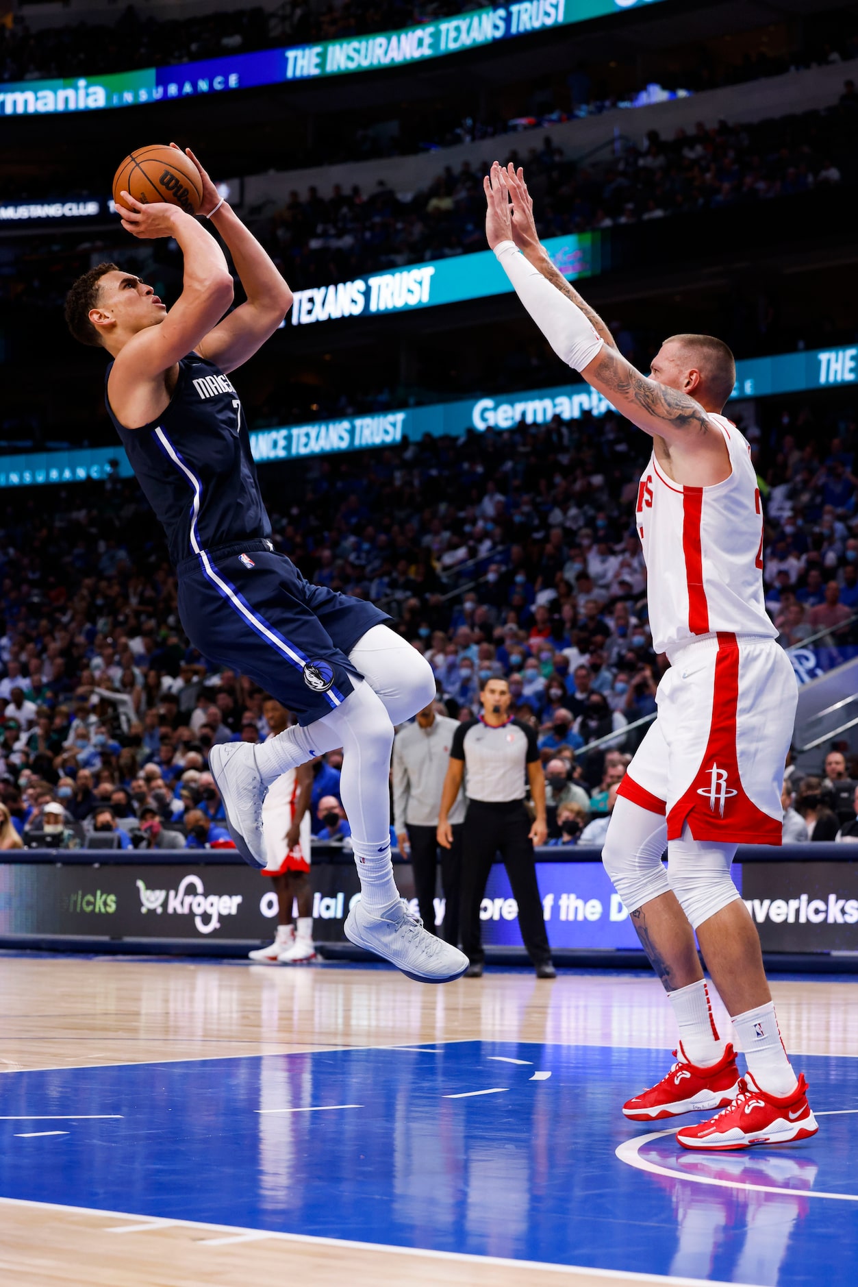 Dallas Mavericks center Dwight Powell (7) shoots during the fourth quarter of the Dallas...