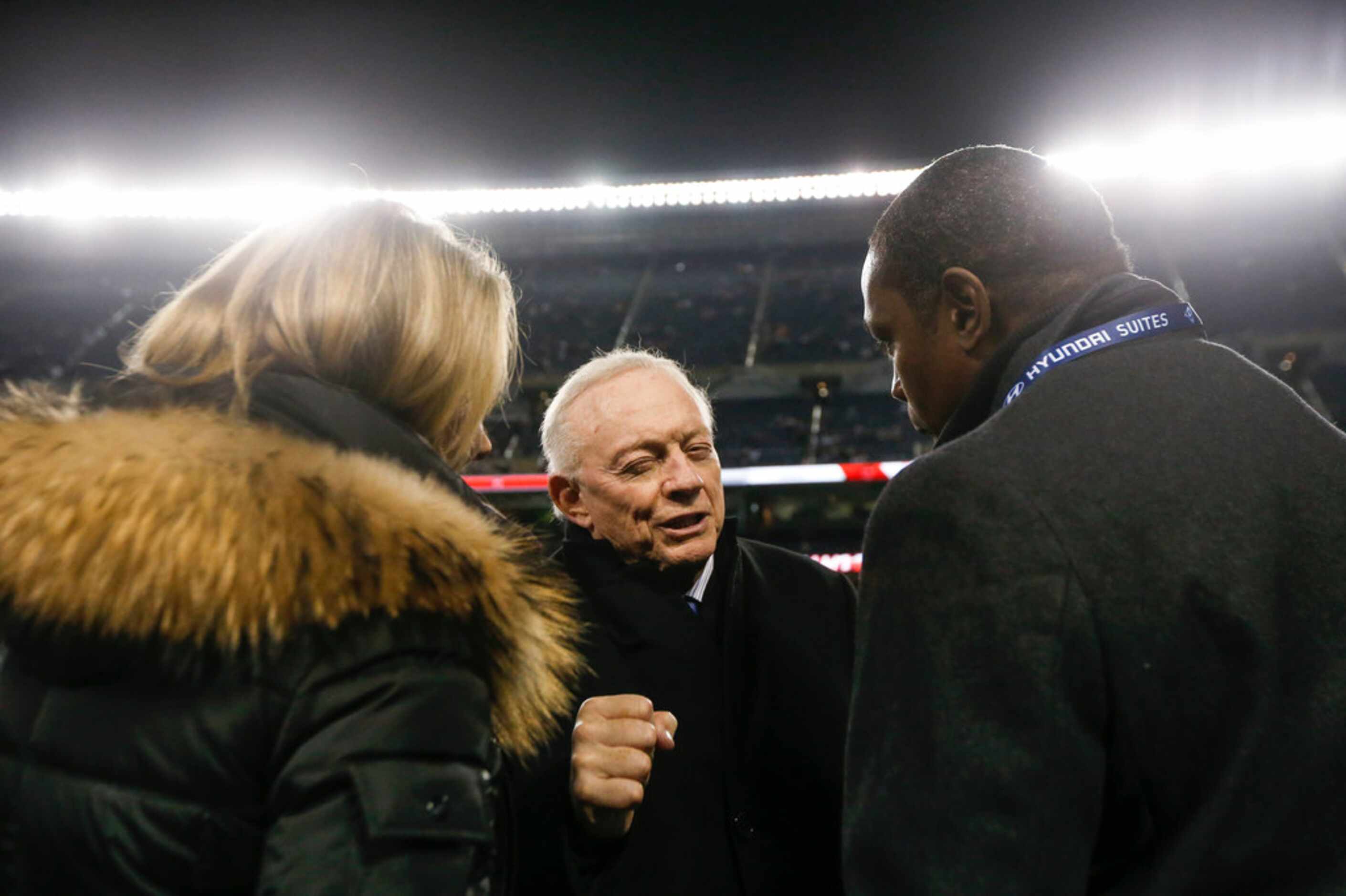 Dallas Cowboys owner Jerry Jones speaks with people on the sidelines prior to a NFL matchup...