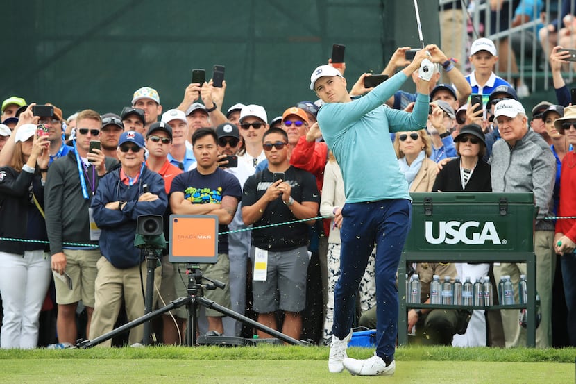PEBBLE BEACH, CALIFORNIA - JUNE 13: Jordan Spieth of the United States plays a shot from the...