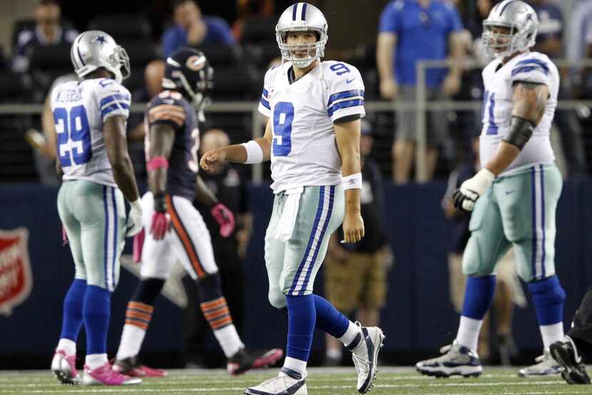Dallas Cowboys quarterback Tony Romo (9) dejected after throwing an interception during the...