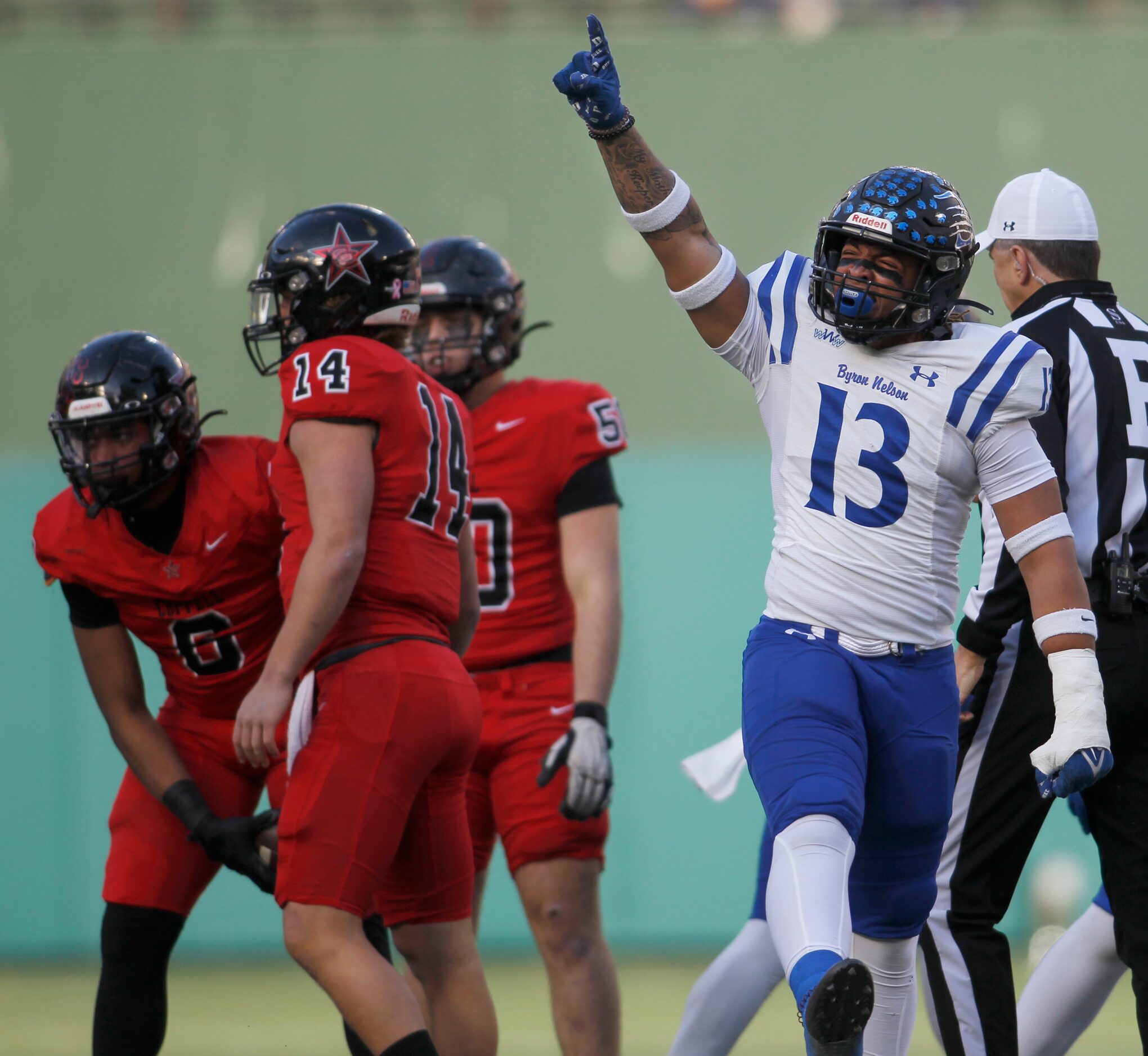 Byron Nelson defender Jaeden Bland (13) celebrates a defensive stop during first quarter...