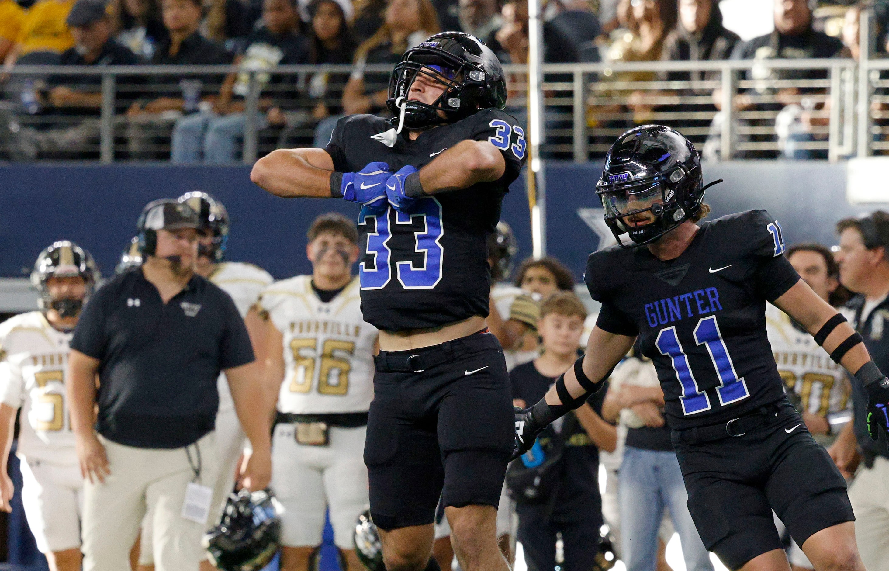 Gunter's  Hayden Farrell (33) reacts after he sacked Woodville's quarterback Luke Babin (13)...