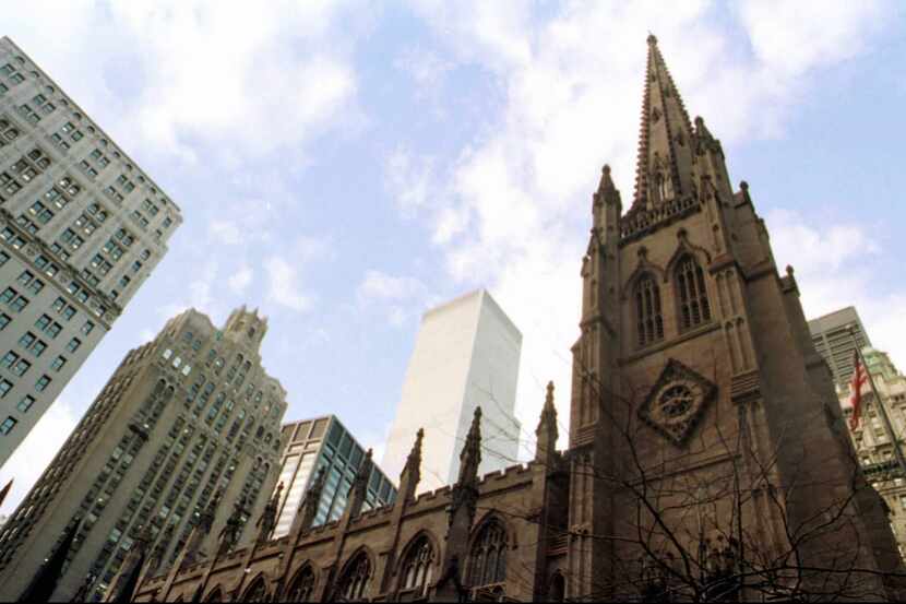This 1997 file photo shows historic Trinity Church in the heart of New York's financial...