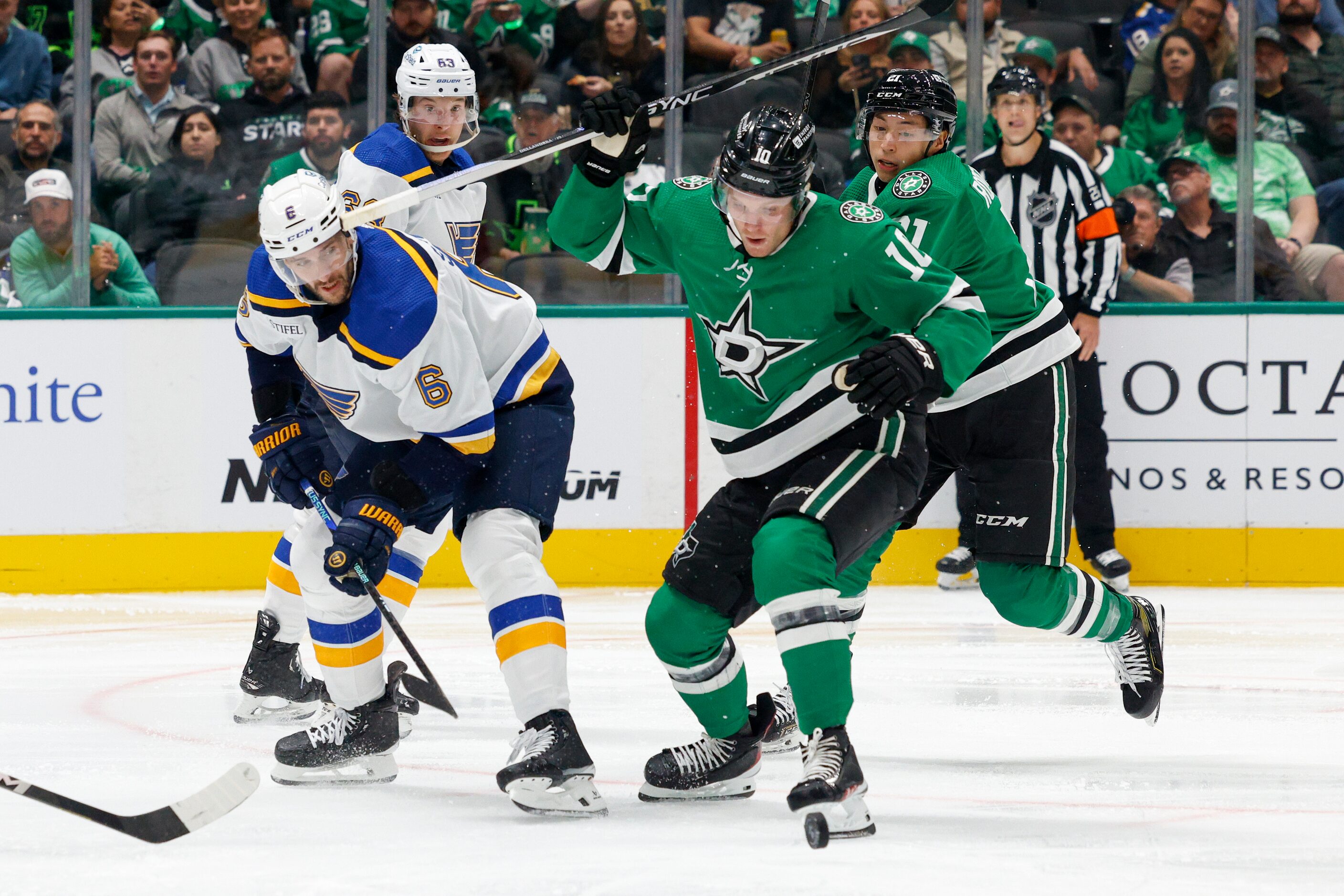 Dallas Stars center Ty Dellandrea (10) battles with St. Louis Blues defenseman Marco...