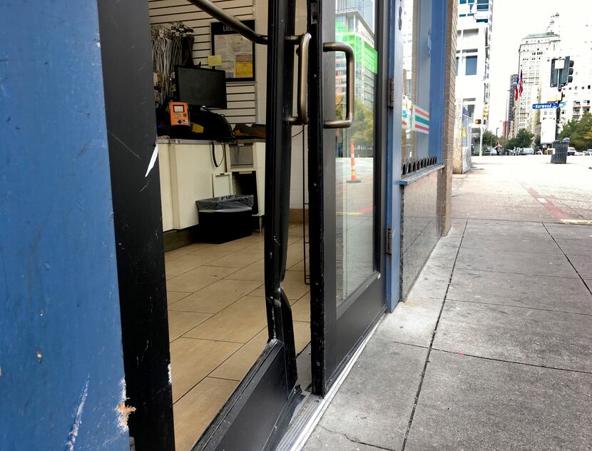 The cash machine shattered the glass and bent the frame of the door as it was pulled free.