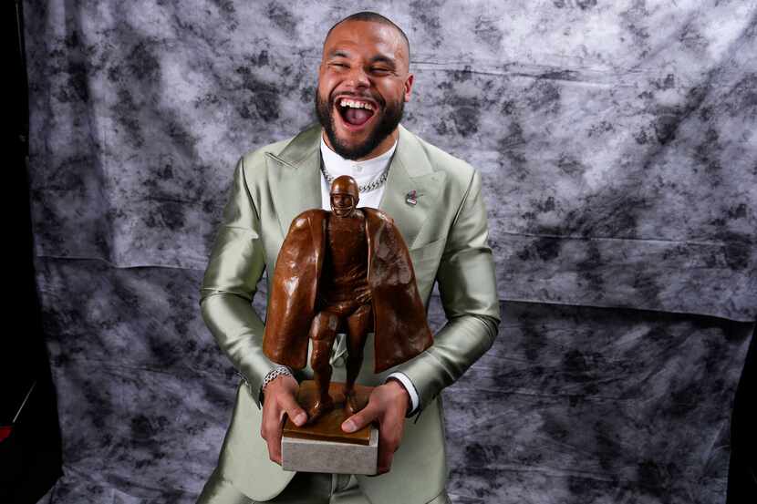 Walter Payton Player of the Year Award winner, Dallas Cowboys' Dak Prescott, poses for a...