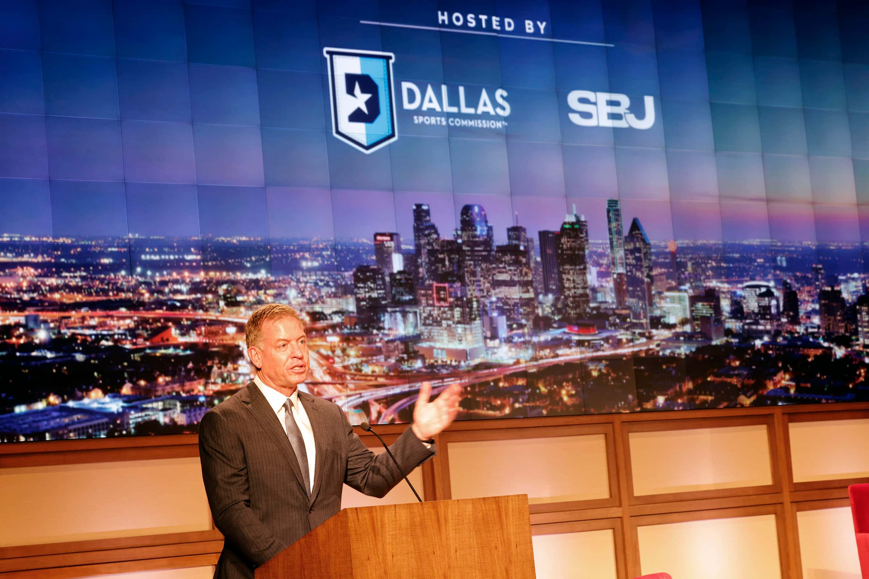 Pro Football Hall of Famer Troy Aikman speaks during a Dallas Sports Commission banquet at...