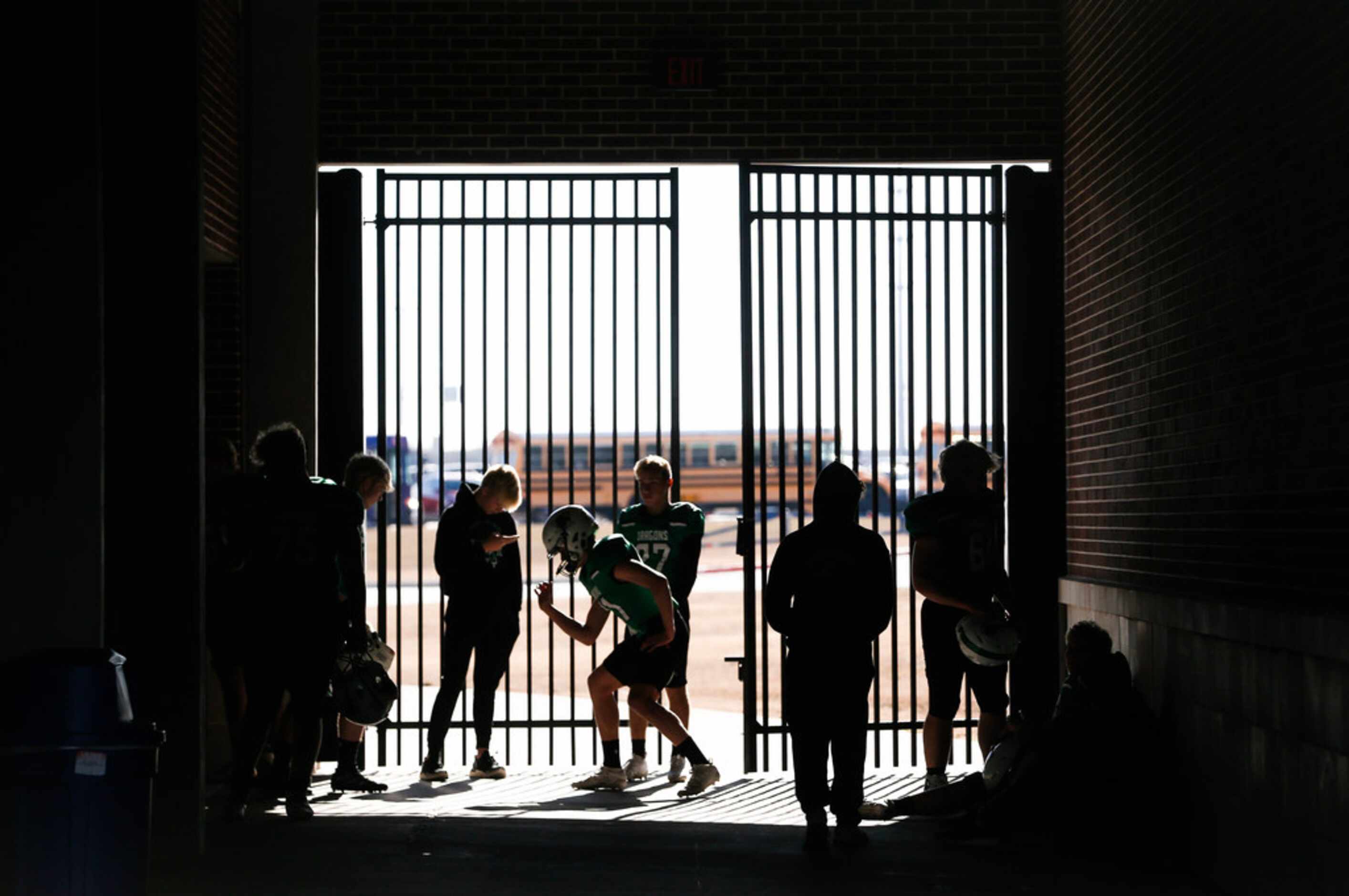 Southlake Carroll players get ready prior to a Class 6A Division I Region I high school...