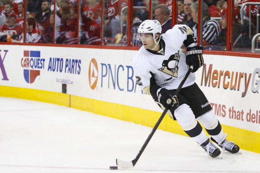 Dec 27, 2013; Raleigh, NC, USA; Pittsburgh Penguins defensemen Matt Niskanen (2) carries the...