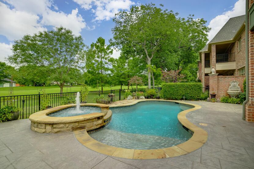 The Hawkins-Welwood estate at 79 Abbey Woods Lane in guard-gated Glen Abbey is priced at...