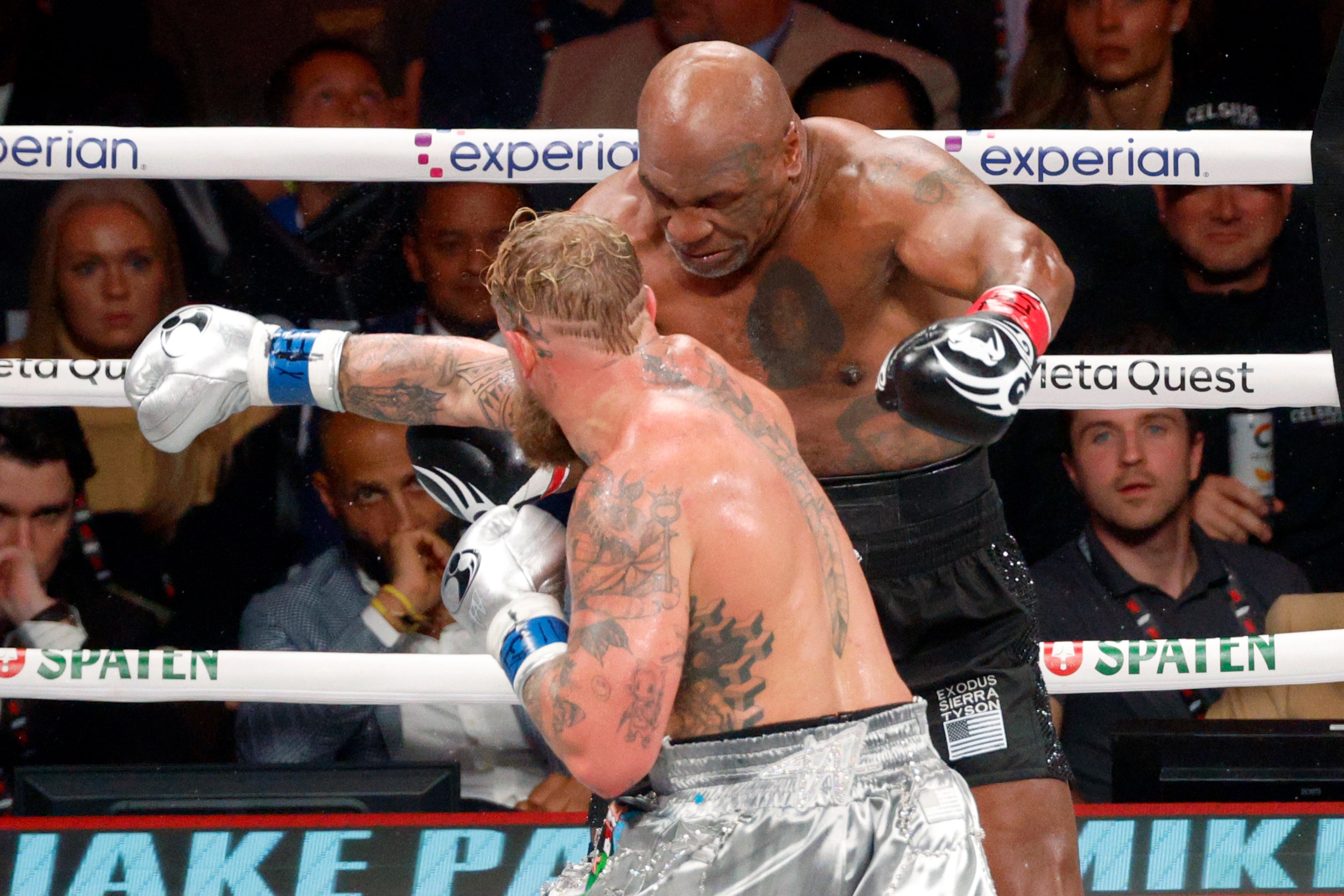 Jake Paul his Mike Tyson during round five of a heavyweight boxing match, Friday, Nov. 15,...