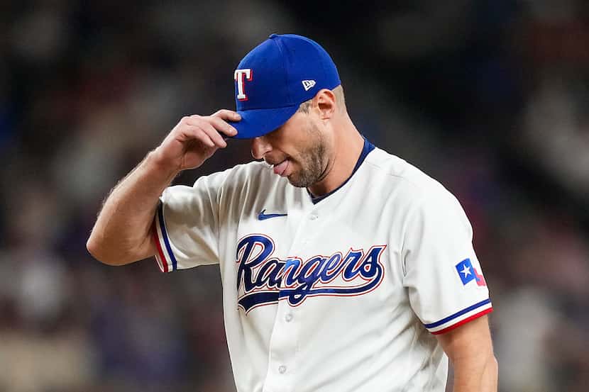 Texas Rangers pitcher Max Scherzer gathers himself during the fourth inning of Game 3 of the...