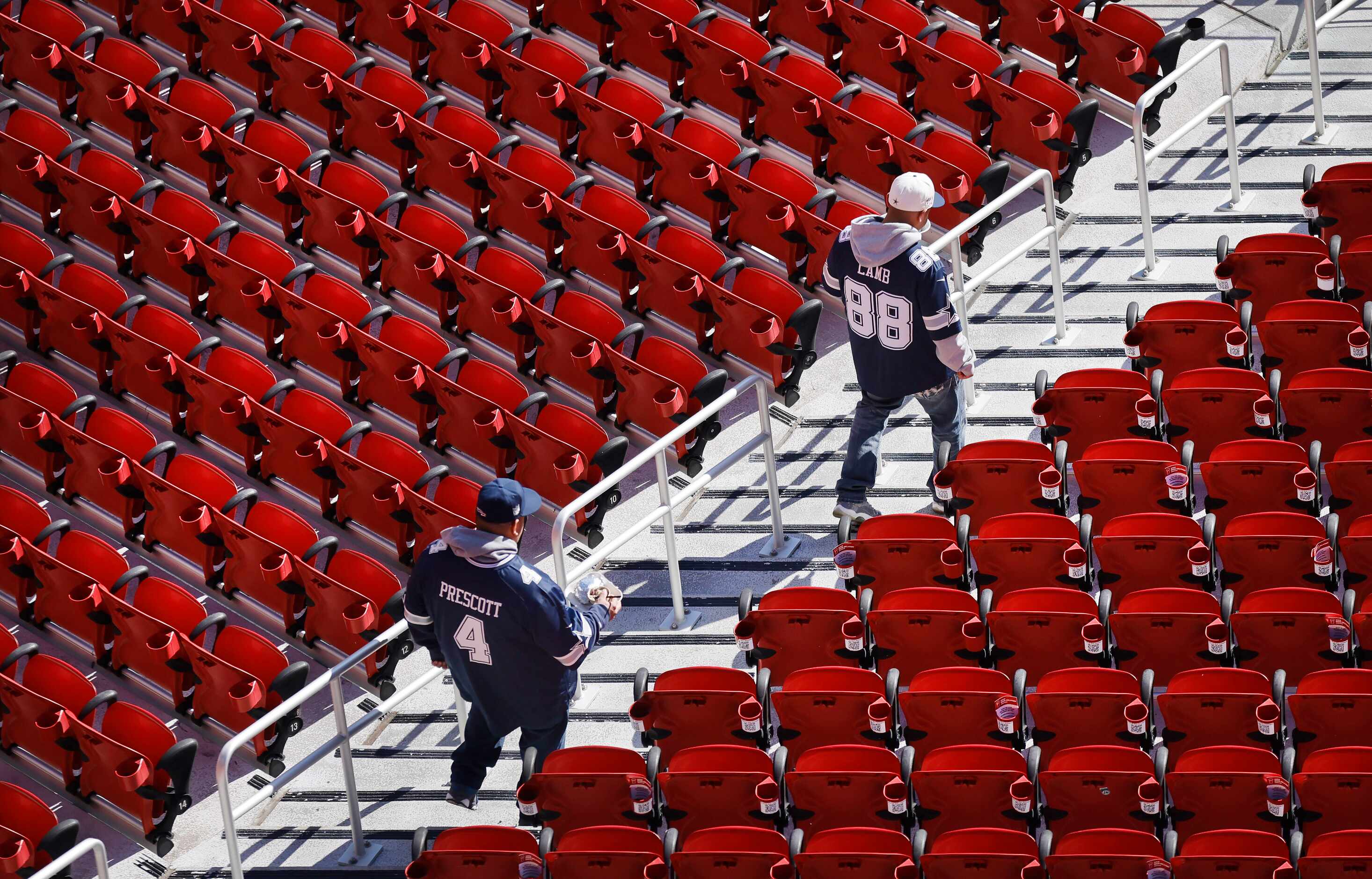 A pair of Dallas Cowboys fans got to their seats early at  Levi’s Stadium in Santa Clara,...