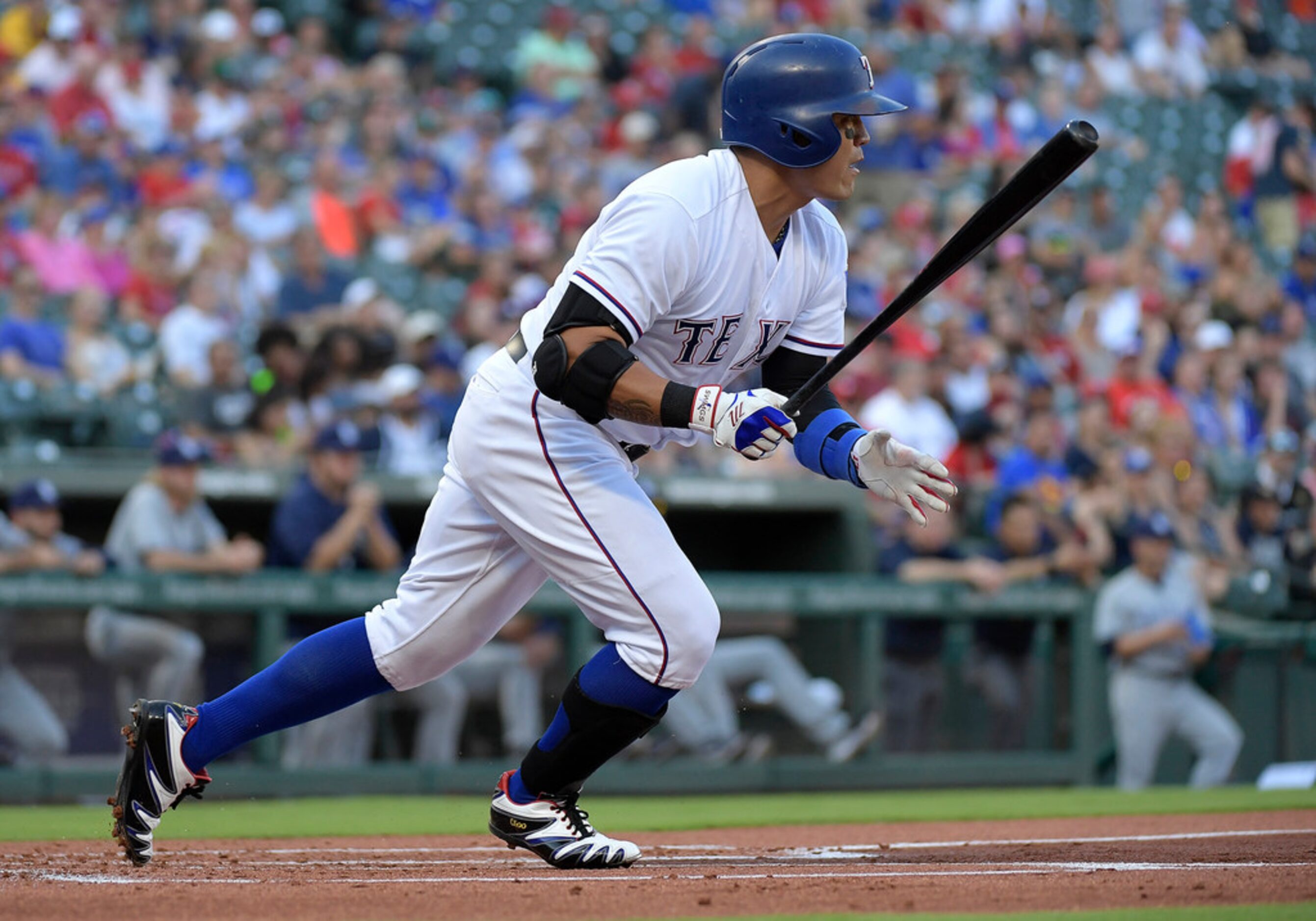 Texas Rangers left fielder Shin-Soo Choo (17) grounds out during the first inning as the...