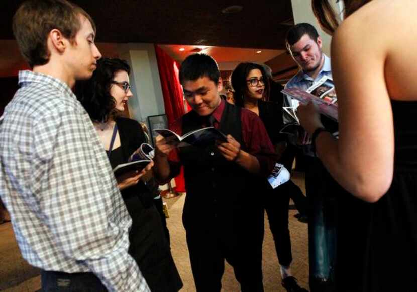 
Students from McKinney High School checked the DSM awards program before the awards gala...