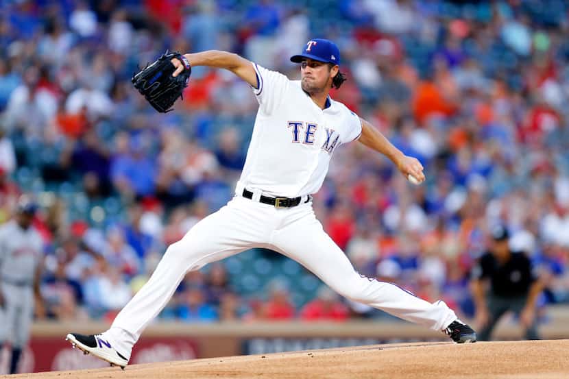 1Texas Rangers starting pitcher Cole Hamels (35) throws against the Houston Astros in the...