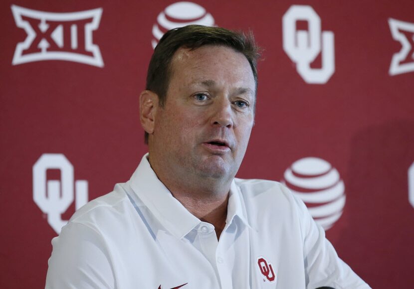 Oklahoma head coach Bob Stoops talks to the media during an NCAA college football media day...