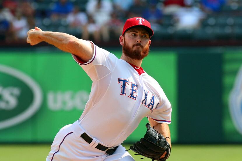 Aug 27, 2015; Arlington, TX, USA;  Texas Rangers relief pitcher Sam Dyson (47) pitches in...