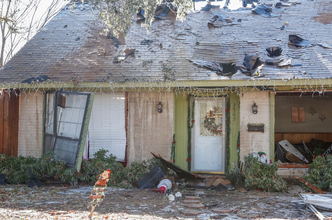 The aftermath of a natural gas explosion at a house located at the southeast corner of...