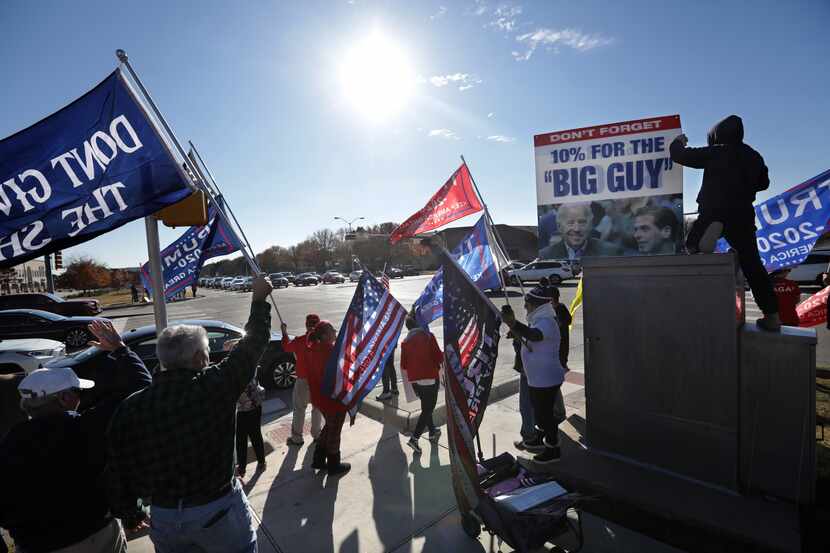 Trump supporters demonstrated at the corner of Preston and Parker roads in Plano on Dec. 12,...