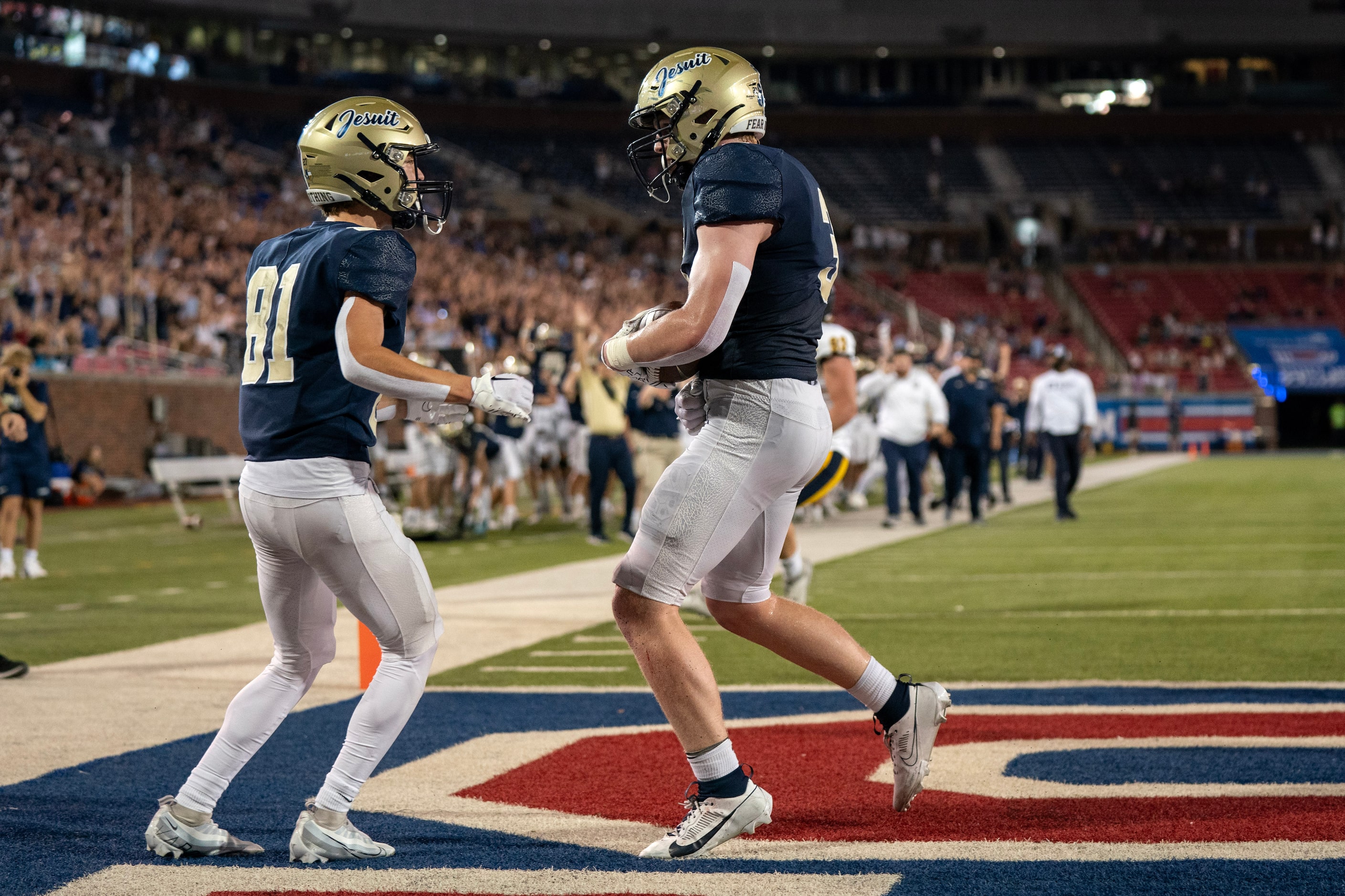 Jesuit junior offensive lineman Cade Gill (3) and junior wide receiver Jack Yeskie (81)...