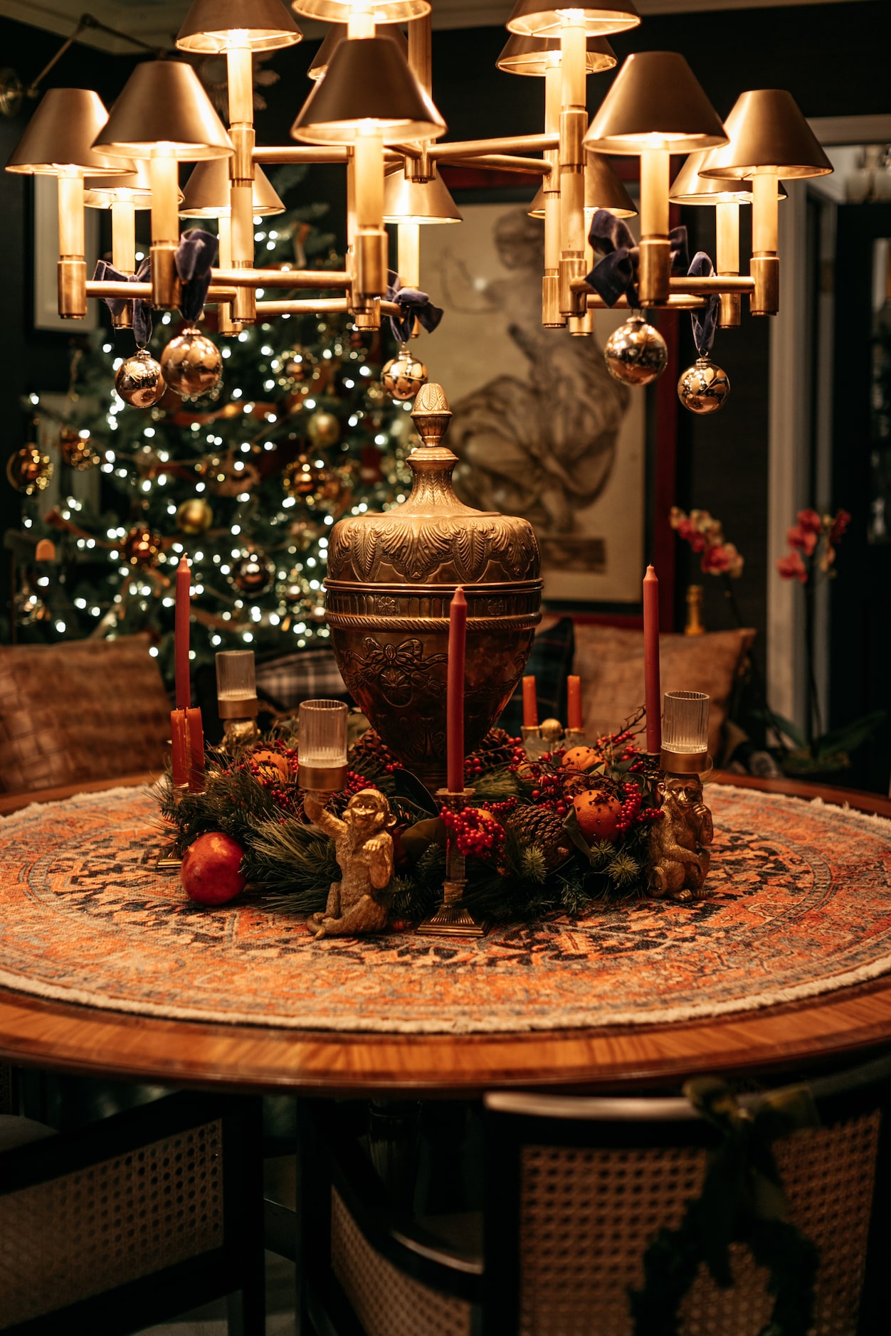 "I love accessorizing with lighting," says Burkle. Here, he hangs ornaments from the dining...