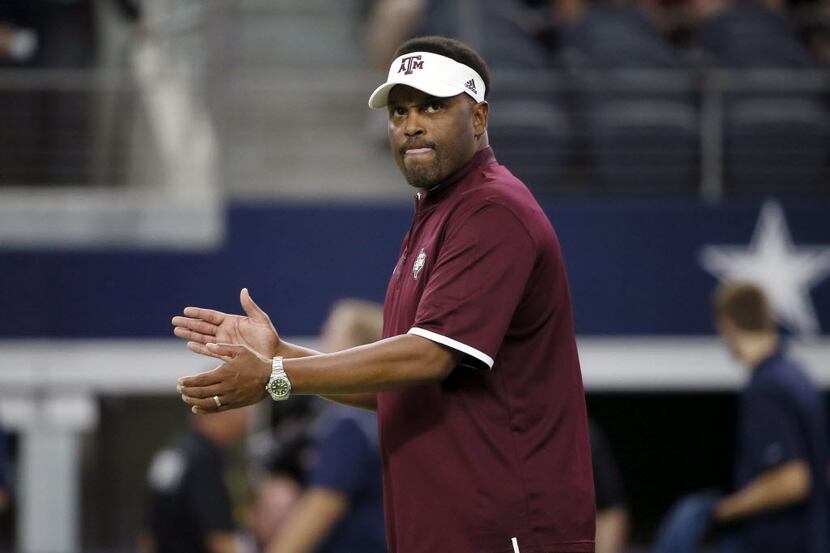 FILE - In this Saturday, Sept. 26, 2015 file photo, Texas A&M coach Kevin Sumlin applauds...